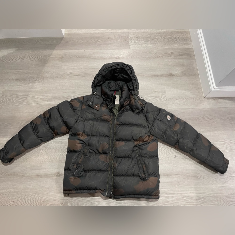 Moncler jacket size 5. Camo color. Great condition.